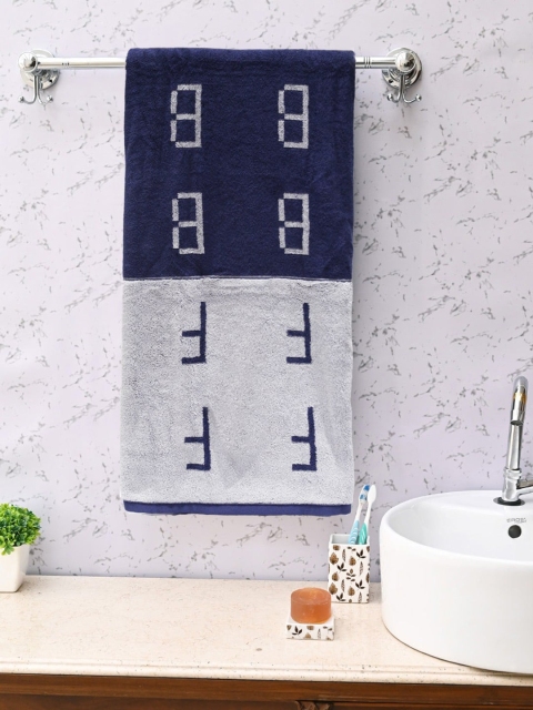 

Trident Blue & Off-White Self-Design 550 GSM Antimicrobial Bath Towel