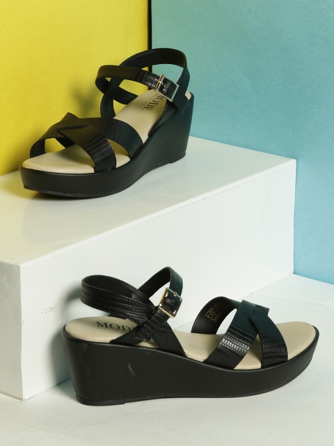 

Mode by Red Tape Women Black Solid Wedges