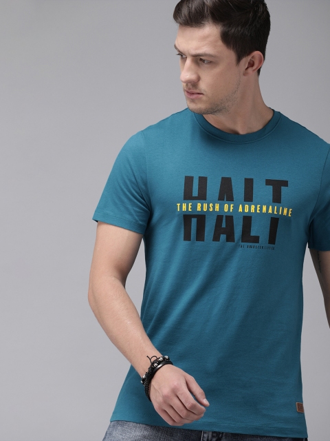 

Roadster Men Teal Blue Printed Round Neck T-shirt