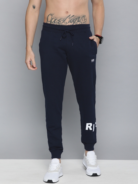 

HERE&NOW Men Navy Blue Solid Joggers with Printed Details