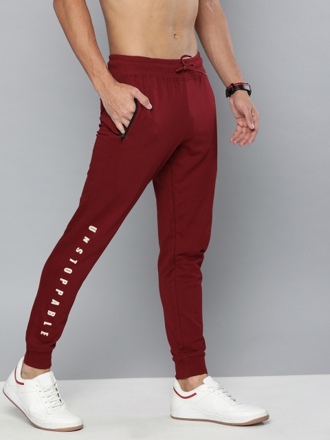 

HERE&NOW Men Maroon Solid Joggers with Printed Detail