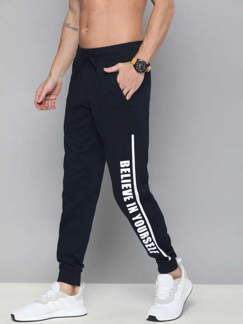 

HERE&NOW Men Navy Blue Solid Joggers with Printed Detail