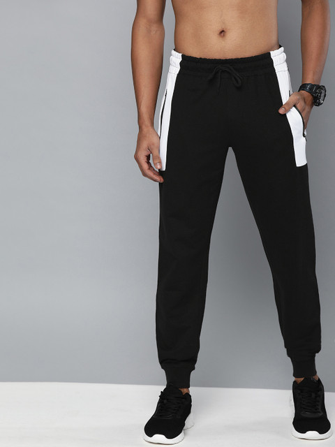 

HERE&NOW Men Black Solid Joggers with Colourblocked Detail