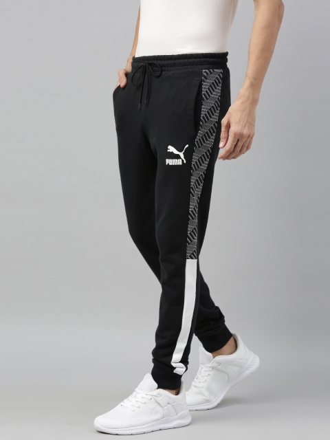 

Puma Men Black Straight Fit Solid Joggers with Side Taping