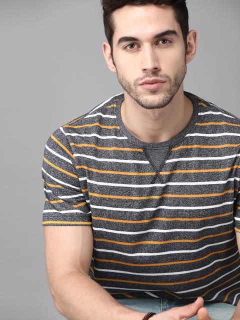 

Roadster Men Navy Blue & White Striped Round Neck T-shirt