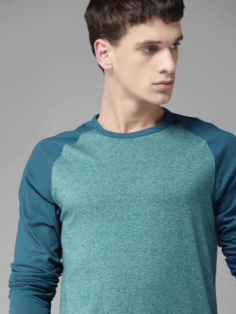 

Roadster Men Teal Green Self Design Round Neck Raglan Sleeves T-shirt