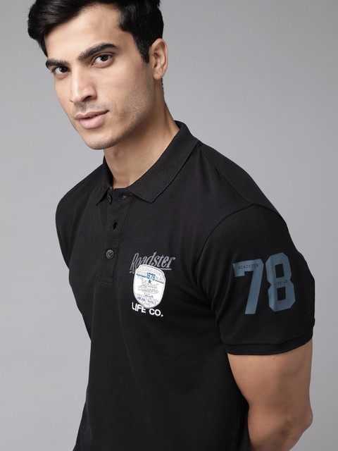 

Roadster Men Black Solid Pure Cotton Polo Collar Pure Cotton T-shirt With Applique Detail