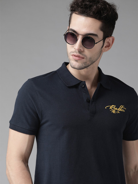 

Roadster Men Navy Pure Cotton Solid Polo Collar T-shirt, Navy blue