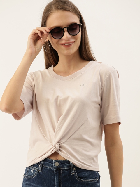 

Calvin Klein Jeans Women Beige Solid Round Neck T-shirt