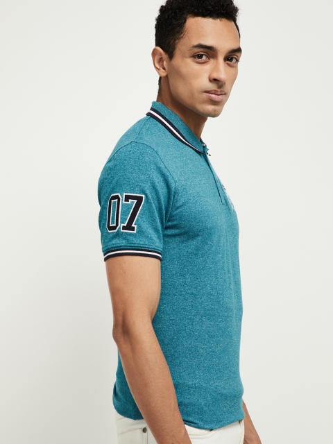 

max Men Blue Solid Polo Collar T-shirt