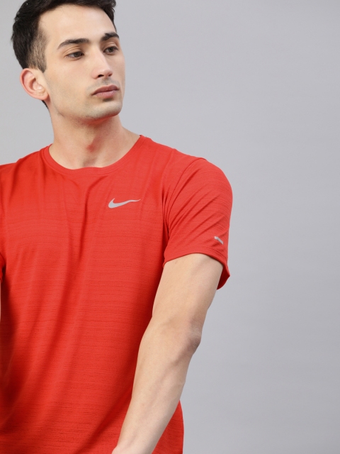 

Nike Men Rust Red Solid MILER SS Round Neck T-shirt
