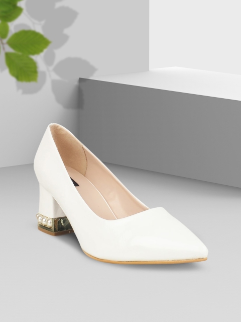 

Sherrif Shoes Women White Solid Pumps