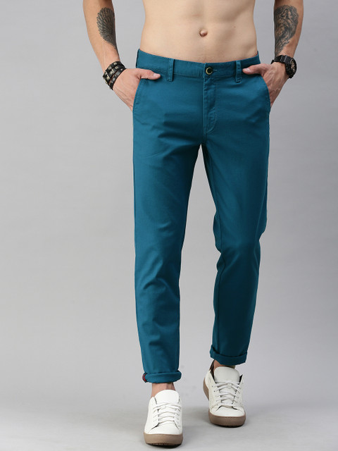 

Roadster Men Teal Slim Fit Self Design Regular Trousers