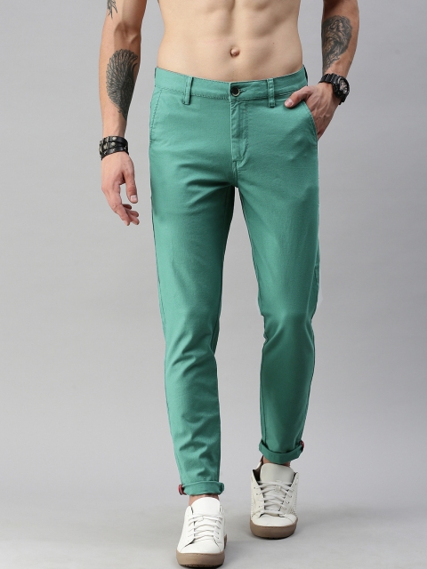 

Roadster Men Green Self Design Regular Fit Trousers