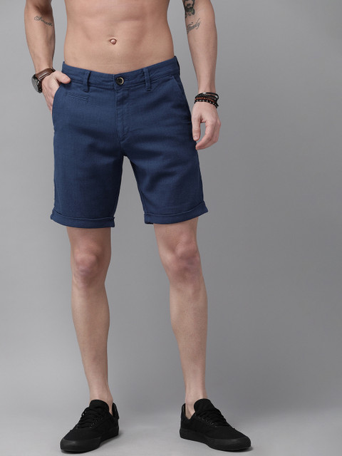

Roadster Men Blue Self Design Regular Fit Regular Shorts