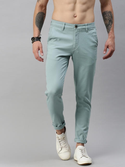 

Roadster Men Blue Self Design Regular Fit Trousers