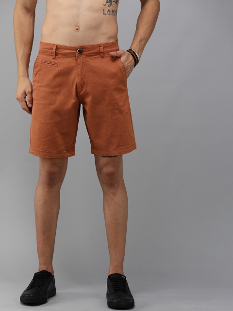 

Roadster Men Orange Solid Regular Fit Regular Shorts