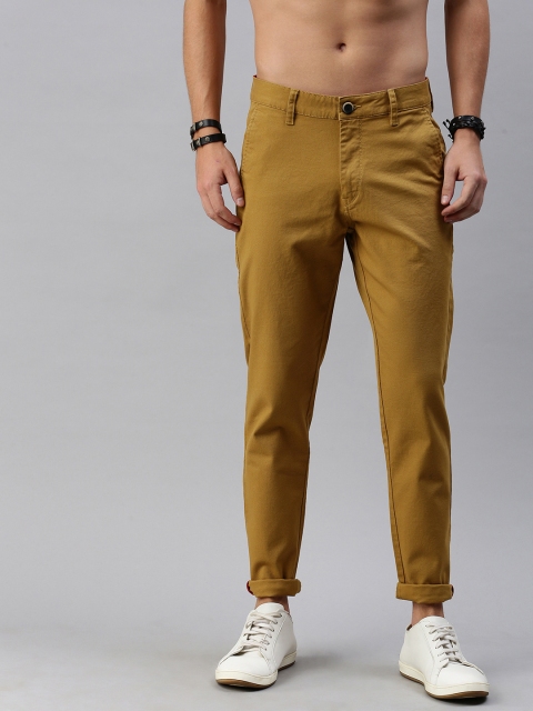

Roadster Men Khaki Self Design Regular Fit Trousers