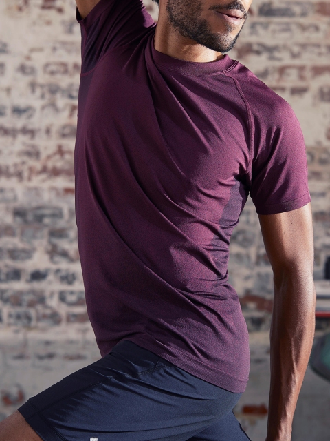 

Domyos By Decathlon Men Burgundy Solid Round Neck Seamless Dynamic Yoga T-shirt