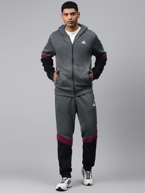 

Adidas Men Charcoal Grey & Black Colourblocked MTS Winterized Hooded Track Suit