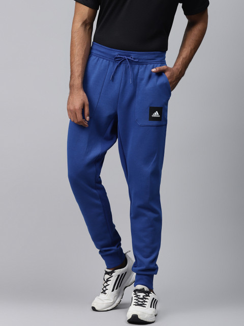 

ADIDAS Men Blue Solid Sports Inspired Must Haves Track Pants