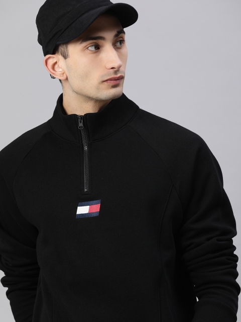 

Tommy Hilfiger Men Black Solid Sweatshirt