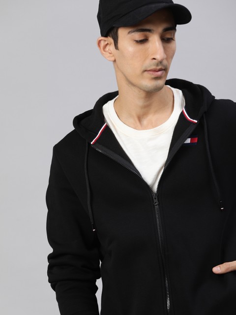 

Tommy Hilfiger Men Black Solid Hooded Sweatshirt