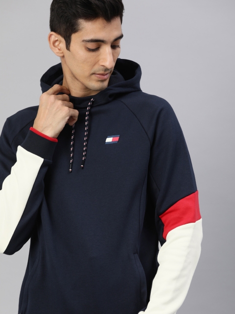 

Tommy Hilfiger Men Navy Blue Solid Hooded Sweatshirt