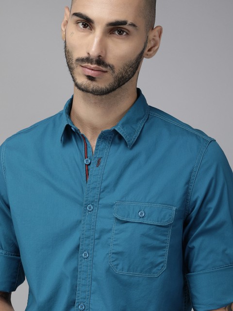 

Roadster Men Teal Blue Hydry Finish Solid Casual Shirt