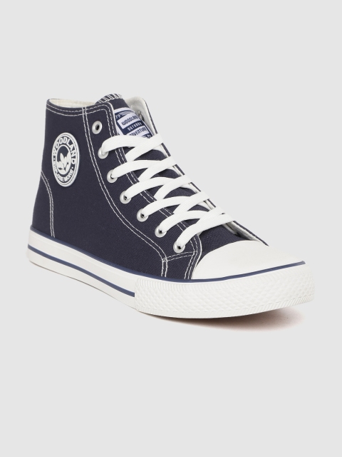 

Woodland Men Navy Blue & White Solid Mid-Top Sneakers