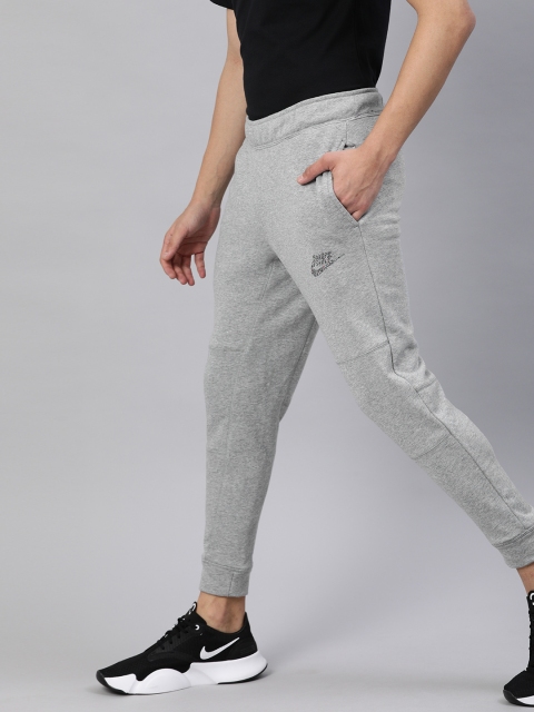 

Nike Men Grey Solid Sportswear NSW FT REVIVAL Joggers