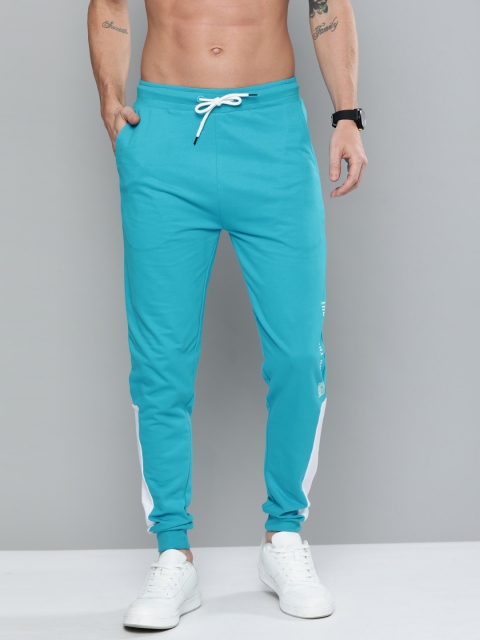 

Kook N Keech Men's Blue Solid Track Pants with Side Stripes