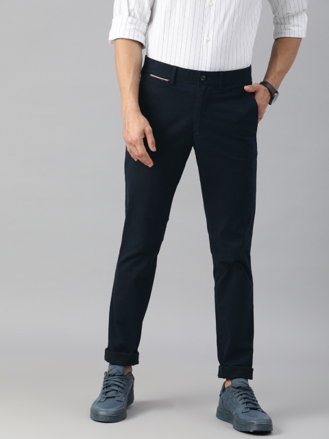 

Tommy Hilfiger Men Navy Blue Slim Fit Solid Regular Trousers