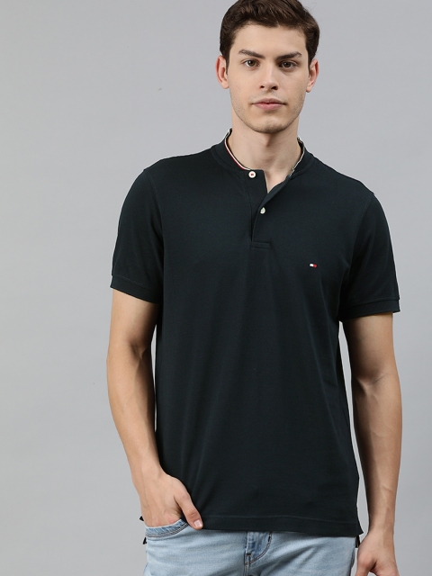 

Tommy Hilfiger Men Navy Blue Solid Polo Collar T-shirt