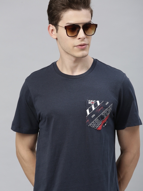 

Tommy Hilfiger Men Navy Blue Solid Round Neck T-shirt