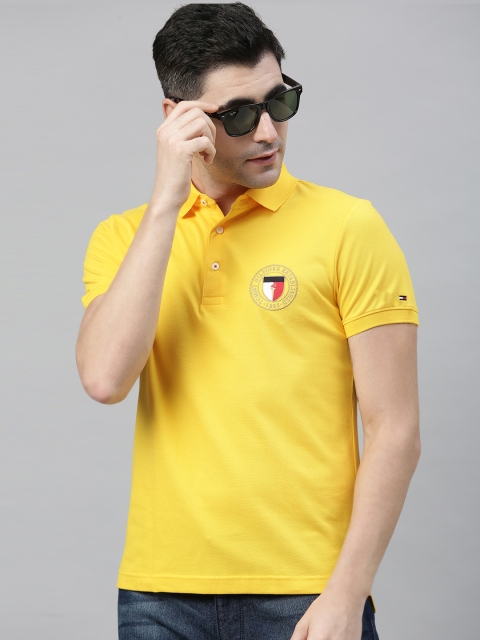 

Tommy Hilfiger Men Yellow Solid Polo Collar Pure Cotton T-shirt