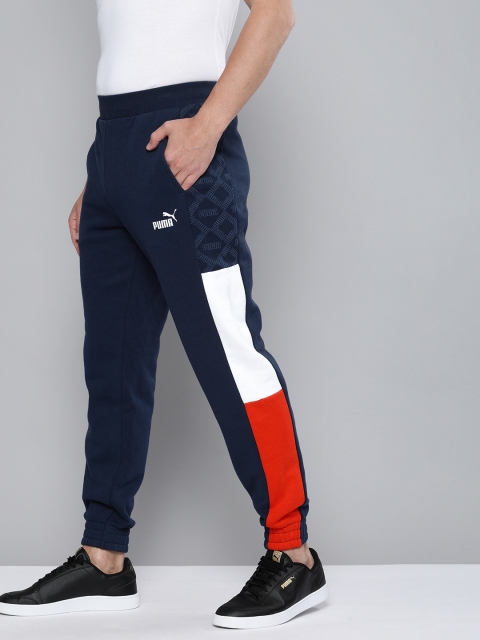 

Puma Men Navy Blue Logo AOP Striped Joggers