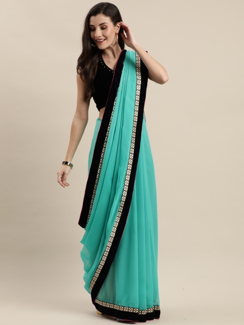 

Mitera Turquoise Blue Solid Poly Georgette Saree