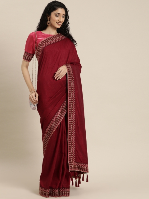 

Inddus Maroon Solid Silk Blend Saree