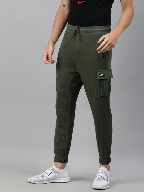 

Nike Men Olive Green Solid Tapered Fit Sportswear AS M NSW ME PANT LTWT MIX Joggers