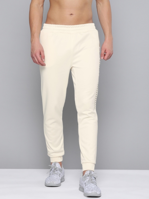

HRX By Hrithik Roshan Men Tofu & Light Taupe Solid Slim Fit Antimicrobial Running Joggers, Cream