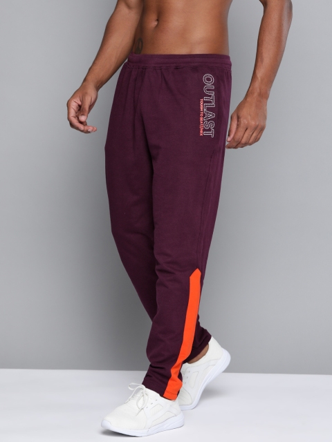 

HRX By Hrithik Roshan Men Fig & Orangeade Typographic Regular Fit Mid-Rise Bio-Wash Lifestyle Track Pants, Burgundy