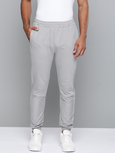 

HRX By Hrithik Roshan Men Wet Weather Solid Slim Fit Mid-Rise Bio-Wash Lifestyle Joggers, Grey