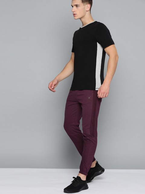 

HRX By Hrithik Roshan Men Fig Solid Slim Fit Mid-Rise Bio-Wash Lifestyle Joggers, Purple