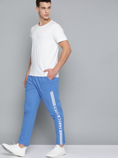

HRX By Hrithik Roshan Men Strong Blue Typographic Regular Fit Mid-Rise Bio-Wash Lifestyle Track Pants