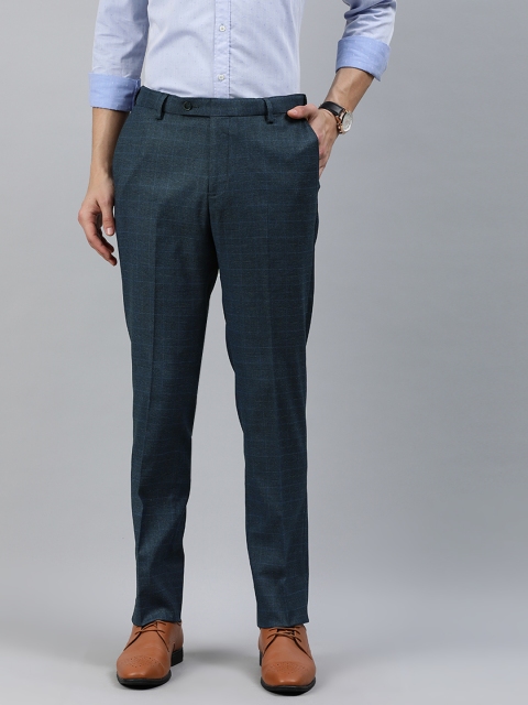 

Arrow Men Navy Blue Tapered Fit Self Design Formal Trousers