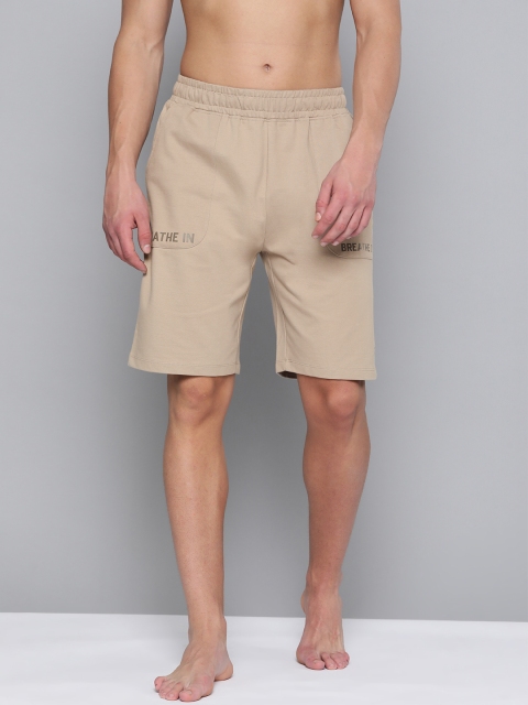

HRX By Hrithik Roshan Men Myrobolan Typographic Regular Fit Organic Cotton Antimicrobial Yoga Shorts, Beige