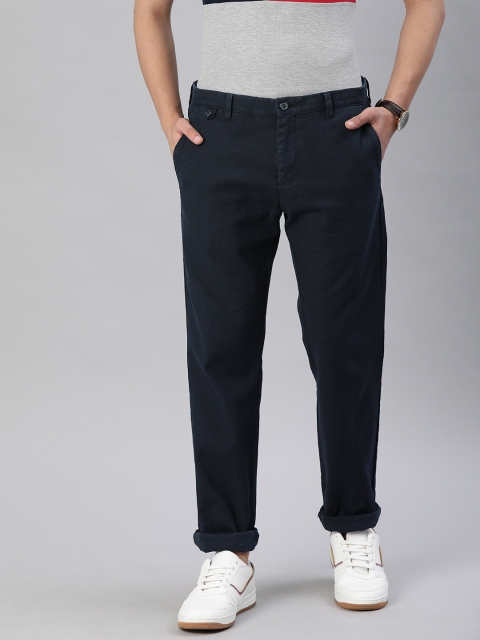 

Tommy Hilfiger Men Navy Blue Slim Fit Solid Regular Trousers