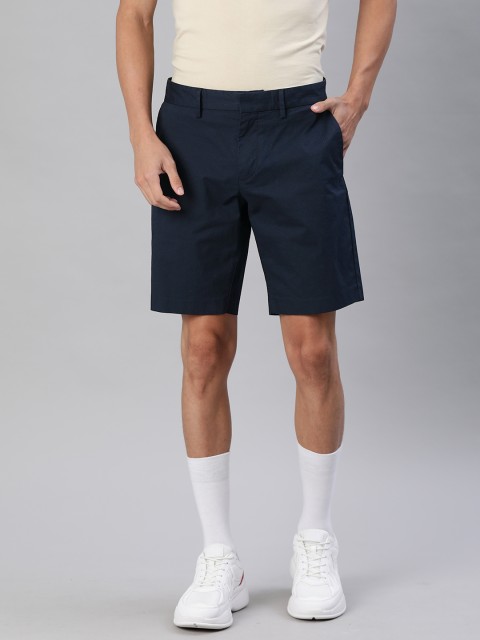 

Tommy Hilfiger Men Navy Blue Solid Regular Fit Chino Shorts