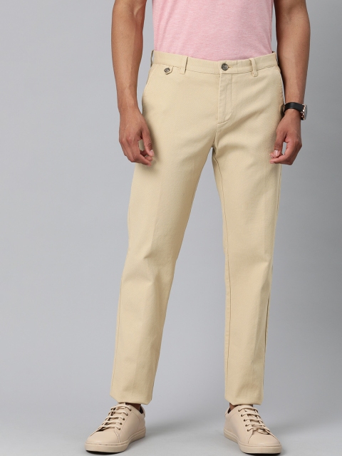 

Tommy Hilfiger Men Beige Slim Fit Solid Chinos